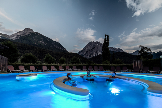 Pure relaxation in the evening in the outdoor pool Pure relaxation in the evening in the outdoor pool